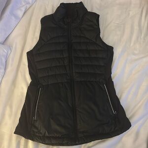 Lululemon women’s puffer vest with reflective zippers